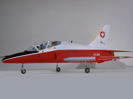Model of a red and white Phoenix Model BAE Hawk Jet 72" ARF V2 on a gray background