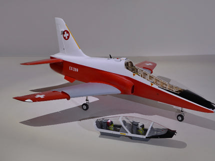 Phoenix Model BAE Hawk Jet 72" ARF V2 Model of a red and white airplane with cargo on a gray background