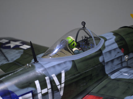 Phoenix Model P-47 Thunderbolt 79" ARF V2 with Electric Retracts Model of a fighter airplane with cockpit details on a gray background