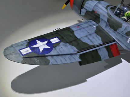 Phoenix Model P-47 Thunderbolt 79" ARF V2 with Electric Retracts Model of a military aircraft with a star emblem on the tail fin.