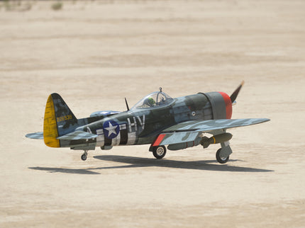 Phoenix Model P-47 Thunderbolt 79" ARF V2 with Electric Retracts Vintage military airplane on a sandy runway