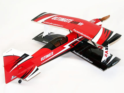 Red and black model airplane with 'Ultimate' branding on a white background