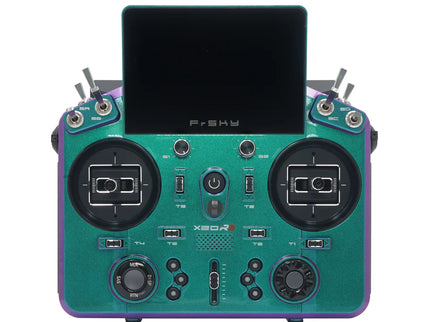 Green and purple radio control transmitter with screen on a white background