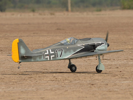 Phoenix Model FOCKE WULF WW2 Model airplane with a German Luftwaffe insignia on a dirt field