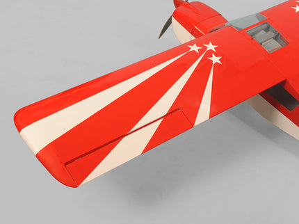 Red and white Phoenix Model DECATHLON model airplane wing on a gray background
