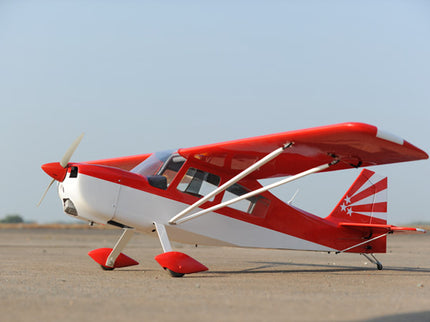 Red and white Phoenix Model DECATHLON  airplane on a clear day