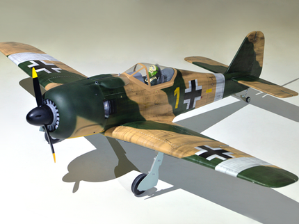Phoenix Model Focke Wulf 55" with Electric Retracts Model of a World War II-era fighter plane with camouflage paint job on a white background