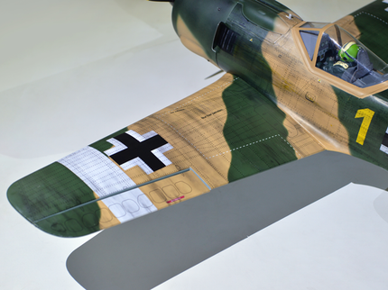 Phoenix Model Focke Wulf 55" with Electric Retracts Model of a World War II-era fighter plane with a visible cross emblem on a white background