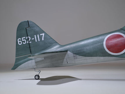 Phoenix Model ZERO A6M 55'' W/Electric Retract Model airplane with a red circle and white border on a gray background