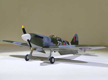 Phoenix Model Spitfire 55" W/Electric Retract Model of a vintage airplane on a plain background