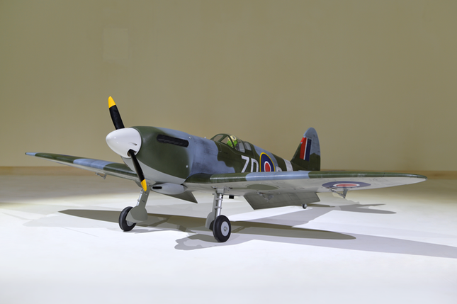 Phoenix Model Spitfire 55" W/Electric Retract Model of a vintage airplane on a plain background