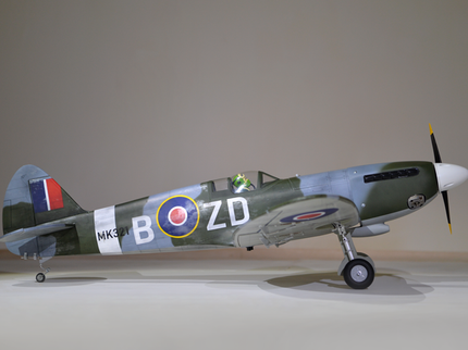 Phoenix Model Spitfire 55" W/Electric Retract Model of a vintage airplane with detailed markings on a neutral background