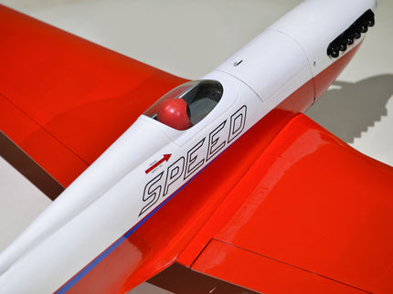 Phoenix Model STREGA 56'' W/Electric Retract Close-up of a red and white model airplane with 'SPEED' written on it.