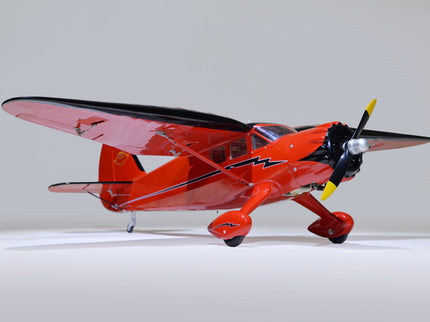 Phoenix Model STINSON RELIANT 68" ARF with red body and black propeller on a white background
