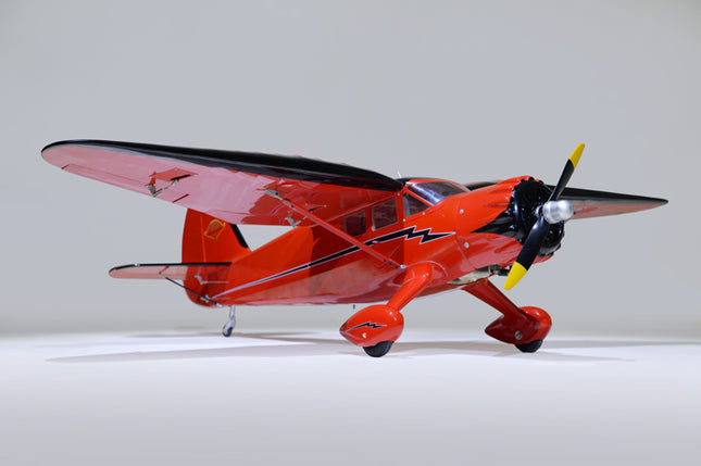 Phoenix Model STINSON RELIANT 68" ARF with red body and black propeller on a white background