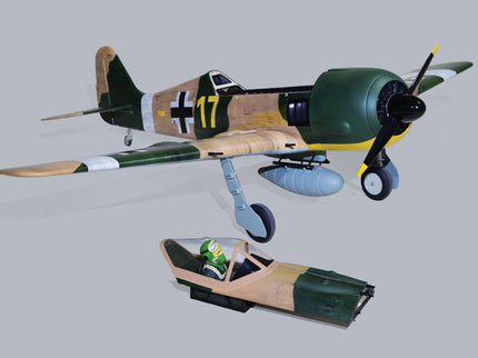 Phoenix Model FOCKE-WULF Fw 190A 85'' W/Electric Retract ARF V2 Model of a World War II fighter plane with a smaller model of a car underneath on a gray background