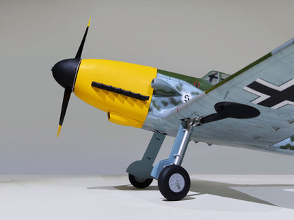 Phoenix Model MESSERCHMITT Bf 109 72'' W/Electric Retract Model airplane with a yellow propeller on a plain background
