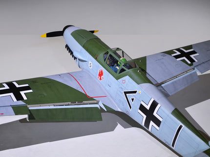 Phoenix Model MESSERCHMITT Bf 109 77'' W/Electric Retract ARF V2 Model of a World War II-era fighter plane with German insignia on a gray background