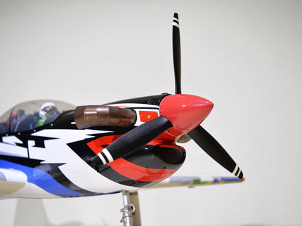 Phoenix Model TUCANO TURBOPROP 103" Model airplane with a propeller on a white background