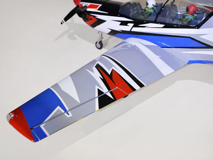 Phoenix Model TUCANO TURBOPROP 103" Model airplane with colorful design on a white surface