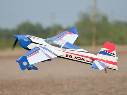 Phoenix Model SLICK 580 67" ARF V2 (20-26cc) Model airplane with 'Slick' branding flying in an open field.