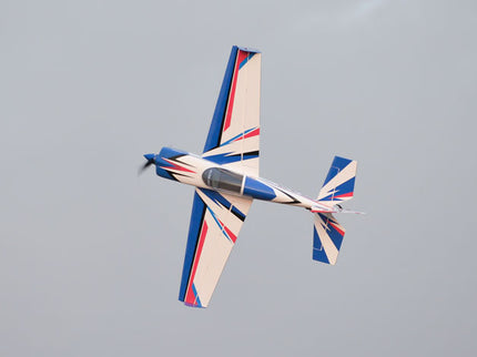 Phoenix Model SLICK 580 67" ARF V2 (20-26cc) model airplane flying against a clear sky