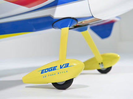 Close-up of Phoenix Model EDGE 540 V3 67'' ARF V2 (20-26cc) model airplane with a yellow wing featuring 'EDGE V3' branding on a white background.