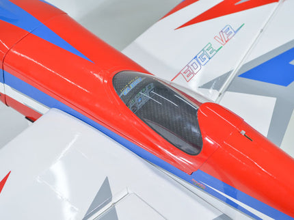 Phoenix Model EDGE 540 V3 60'' Close-up of a model airplane with red, white, and blue colors on a white background.