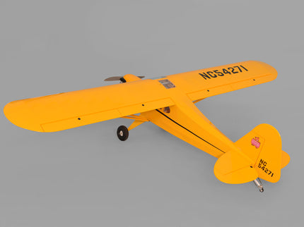 Yellow Phoenix Model PIPER J3 CUB model airplane with black text on a gray background