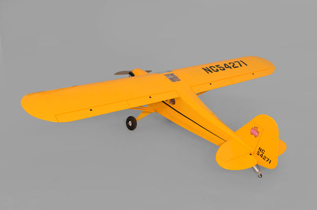 Yellow Phoenix Model PIPER J3 CUB model airplane with black text on a gray background
