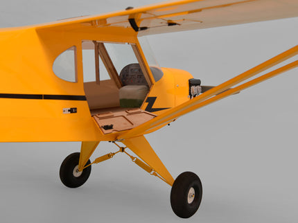 Yellow Phoenix Model PIPER J3 CUB on a gray background
