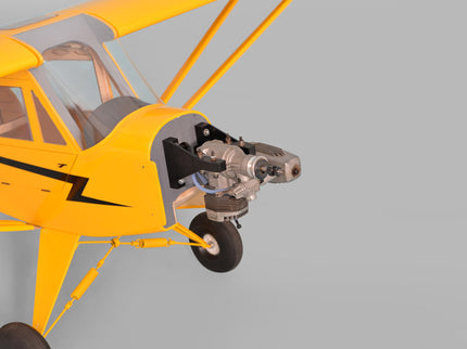 Yellow Phoenix Model PIPER J3 CUB model airplane with a engine on a gray background