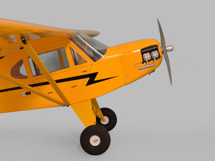 Yellow Phoenix Model PIPER J3 CUB model airplane with a propeller on a gray background