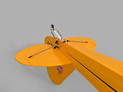 Yellow Phoenix Model PIPER J3 CUB  model airplane on a gray background