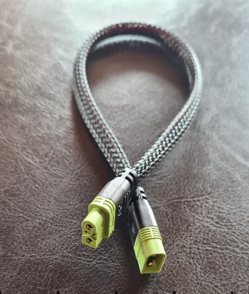 AR1 Extension, Braided cable with green connectors on a textured surface