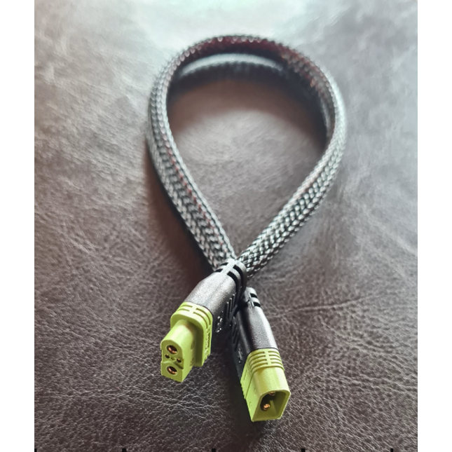 AR1 Extension, Braided cable with green connectors on a textured surface