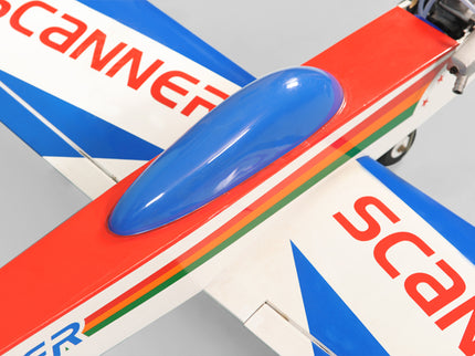 Close-up of a Phoenix Model PH006-SCANNER 57" model airplane with 'Scanner' branding on a gray background